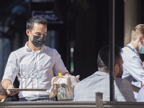 A server at a restaurant in Montreal.