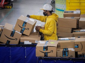 Amazon typically hires legions of temporary workers this time of year to help store, pack and ship items from its warehouses.