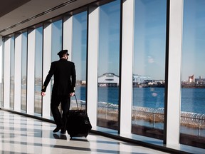 A pilot moves through New York's LaGuardia Airport on December 3, 2020 in New York City.