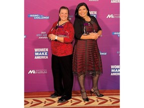 From L: AGCO Leaders Christine Enge and Roseane Campos with their STEP Ahead Awards from the Manufacturing Institute.