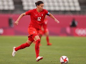 Christine Sinclair of Team Canada runs with the ball during the Tokyo Olympic Games in August.
