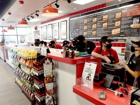 Restaurant Brands International Inc is adding Firehouse Subs to its roster of outlets including Tim Hortons, Burger King and Popeyes.