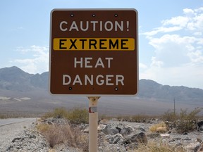 A sign warns of extreme heat in Death Valley, California.