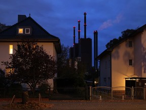 The Heizkraftwerk Lichterfelde natural gas-fired power and heating plant stands behind residential houses on Nov. 3, 2021 in Berlin, Germany.