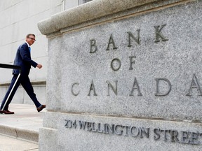 Governor Tiff Macklem walks outside the Bank of Canada building in Ottawa, Ont. on June 22, 2020.