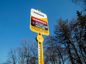 A signpost marks the presence of Enbridge's Line 5 pipeline in Sarnia, Ont. on March 20, 2021.