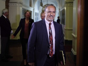 Labour Minister Harry Bains arrives to the start of the debate at B.C. Legislature in Victoria on June 26, 2017.