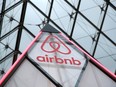 The Airbnb logo is seen on a little mini pyramid under the glass Pyramid of the Louvre museum in Paris, France, March 12, 2019.