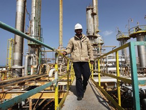 An oil refinery in Libya. Canada joined more than a dozen other countries in a pledge to stop financing new oil and gas projects — in other countries — by the end of next year.