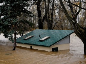 A restrooms building in Hougen Park is seen submerged after rainstorms lashed the western Canadian province of British Columbia, triggering landslides and floods, shutting highways, in Abbotsford, British Columbia.