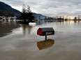 Flood water is seen a week after rainstorms lashed British Columbia, triggering landslides and floods, shutting highways, in Abbottsford, British Columbia.
