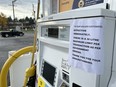 A sign is posted on a gas pump notifying customers of a 30 liter limit on fuel purchases on November 21, 2021 in Abbotsford, British Columbia.