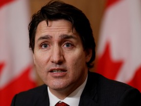 Prime Minister Justin Trudeau says Canada would be willing to "align" its own electric-vehicle incentives with those south of the border.