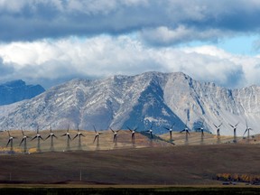 Windmills generate electricity in the windy rolling foothills of the Rocky Mountains near the town of Pincher Creek, Alberta, on Sept. 27, 2010.