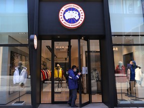 A man enters a Canada Goose store in Beijing, China on Dec. 2, 2021.