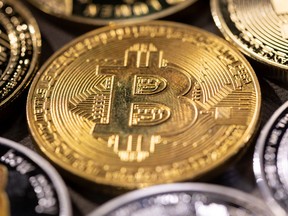 Bitcoin lost as much as 21 per cent since Friday's stock-market close and swung wildly throughout the weekend.