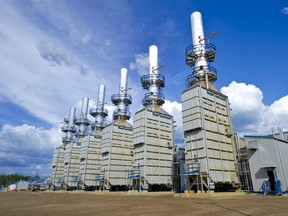 Devon Energy Corp.'s steam generation plant operates at the company's 35,000 barrel per day Jackfish Projects site near Conklin, Alta., on June 28, 2010.