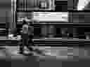 Pedestrians pass in front of the Toronto Stock Exchange in the financial district of Toronto on Sept 16, 2021. 