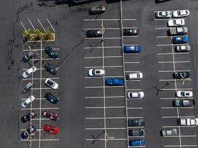 Vehicles in a nearly empty lot at a car dealership in Richmond, California, on July 1, 2021.