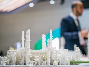 An oil refinery model is displayed during the 23rd World Petroleum Congress conference at the George R. Brown Convention Center on Dec. 7, 2021 in Houston, Texas.