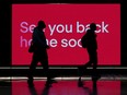 Passengers walk through the international departures terminal of Sydney Airport in Sydney, Australia.