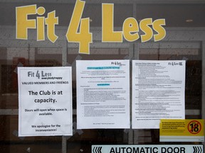 A closed Fit 4 Less gym in Toronto on Jan. 5, 2022. Ontario said it will once again force restaurants to close, shift schools to online learning and order companies to work from home as the government tries to prevent COVID-19 from overwhelming the hospital system.