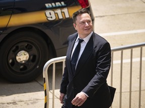 Elon Musk, chief executive officer of Tesla Inc., departs court in Wilmington, Delaware.