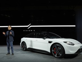 Kenichiro Yoshida, chairman, president and CEO of Sony Group Corporation, speaks as the Sony VISION-S 01 sedan is on display for CES 2022 at the Mandalay Bay Convention Center in Las Vegas, Nevada.