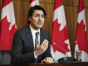 Prime Minister Justin Trudeau speaks during a press conference in Ottawa on Jan. 12, 2022.