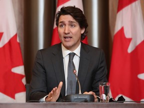Prime Minister Justin Trudeau speaks during a news conference in Ottawa on Jan. 12, 2022.