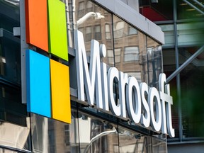 Microsoft signage is displayed outside a Microsoft Technology Center in New York, U.S., on Wednesday, July 22, 2020. Microsoft Corp. is set to post quarterly results after the closing bell and the tech bellwether's performance will likely uphold its standing as a darling of Wall Street. Photographer: