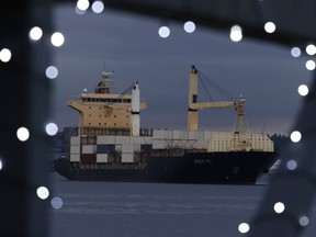 A container ship anchored near the Port of Vancouver on Nov. 20, 2021.