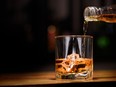 Pouring a shot of scotch