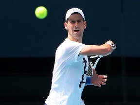 Serbia's Novak Djokovic takes part in a training session in Melbourne ahead of the Australian Open tennis tournament on January 11, 2022.