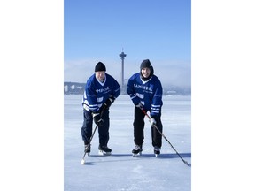 Local hockey legends Lasse Oksanen (left) and Ville Nieminen (right) on the ice of Lake Näsijärvi in Tampere. Oksanen has scored most international goals (101) for Team Finland. Nieminen won NHL Stanley Cup with Colorado Avalanche in 2001.