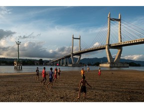 Concrete in Life 2021 Overall Winner (and Urban Concrete Category Winner): Agung Lawerissa @lawerisaid, Merah Putih Bridge in Indonesia "I took my photo in the city of Ambon, Indonesia. I was interested in capturing this moment because there was a group of children playing soccer in the sand at low tide with Merah Putih bride in the background. The bridge was built to speed up the travel time between Patimura Airport on the Lei Hitu Peninsula, Central Maluku in the north and Ambon City Center on the East Lei Peninsula in the south. It is a great honour to win the Concrete in Life 2021 competition and tell the story of how concrete is bringing communities together in my country."