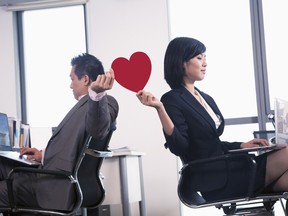 About a third of U.S. workers say they're currently in or have been a part of a workplace romance.