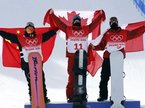 Yiming Su of Team China wins the silver medal, Max Parrot of Team Canada wins the gold medal, Mark Mcmorris of Team Canada wins the bronze medal.