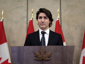 Prime Minister Justin Trudeau speaks about the ongoing protests in Ottawa and blockades at various Canada-U.S. borders, in West Block on Parliament Hill, Feb. 11, 2022.