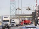 Traffic flows over the Ambassador Bridge in Windsor, Ont., on Feb. 14, 2022 after protesters blocked the major border crossing for nearly a week. 