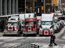 Vehicles on a street as truckers and supporters continue to protest COVID-19 vaccine mandates in Ottawa on Feb.  16, 2022. 