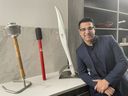 Usman Tahir Jutt with his Canadian Olympic torch collection in Calgary.