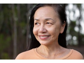 Older adult smiling during a walk in nature