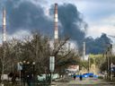 Smoke rises from a power plant after shelling outside the town of Schastia, near the eastern Ukraine city of Lugansk.
