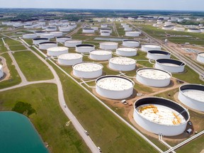 Crude oil storage tanks are seen in an aerial photograph at the Cushing oil hub in Cushing, Oklahoma.