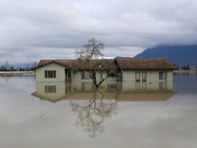 A home surrounded by floodwaters in Chilliwack, British Columbia, on Nov. 20, 2021.
