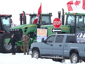Trucks and tractors blockade the U.S.-Canada border crossing during a demonstration in Emerson, Manitoba.