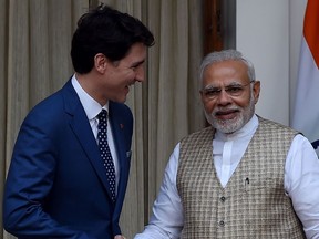 Prime Minister Justin Trudeau and Prime Minister Narendra Modi shake hands before a meeting at Hyderabad house in New Delhi in Feb. 23.