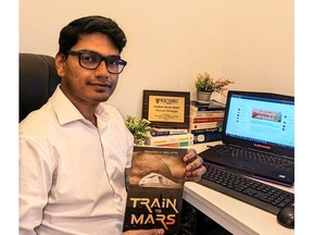 Praveen Kumar Neelappa with his New Book - Train to Mars