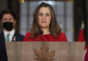 Deputy Prime Minister Chrystia Freeland, seen here with Prime Minister Justin Trudeau, announced today that Canada will revoke nation status to Russia and Belarus.